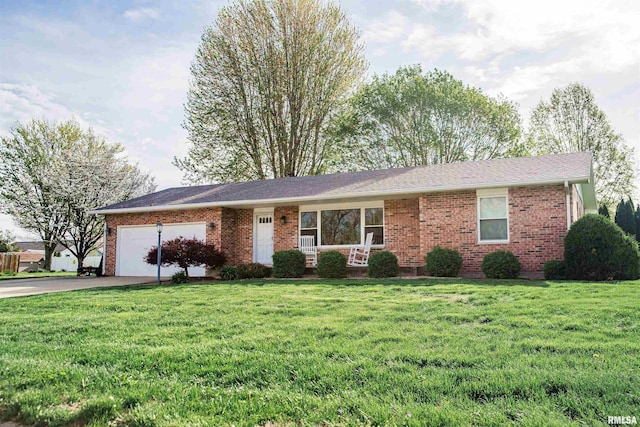 3122 Gross Gables St, Quincy, IL 62305 - ranch-style home with brick siding, a front yard, a garage, and aphalt driveway
