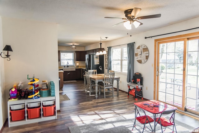 3122 Gross Gables St, Quincy, IL 62305 - dining space with baseboards, dark wood-style floors, and ceiling fan