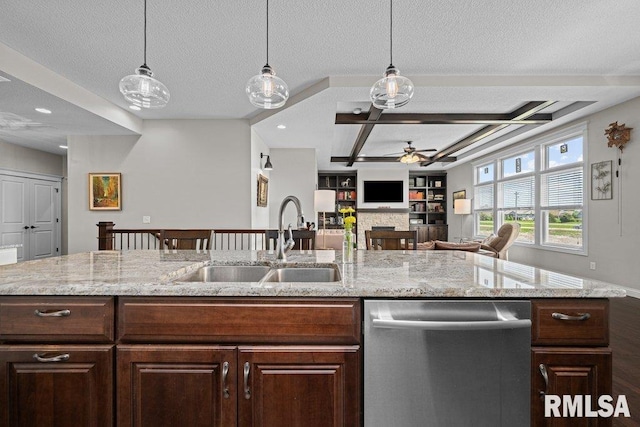 kitchen featuring a sink, coffered ceiling, a ceiling fan, decorative light fixtures, and dishwasher