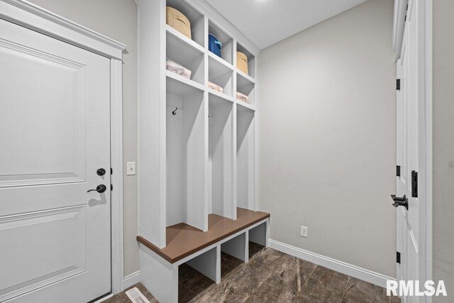 mudroom featuring baseboards