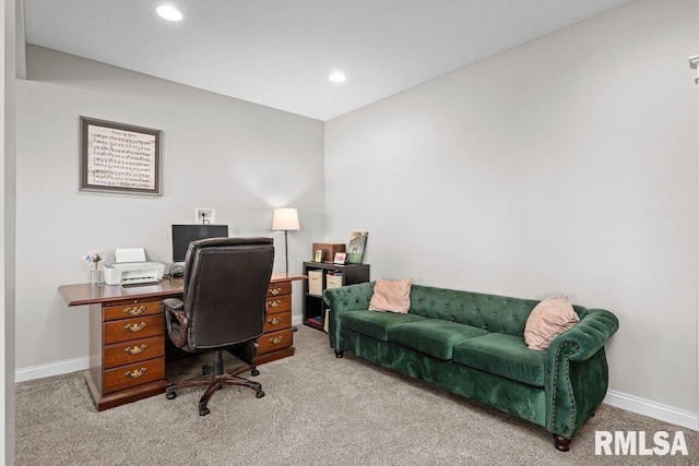 office space featuring baseboards, recessed lighting, and light carpet