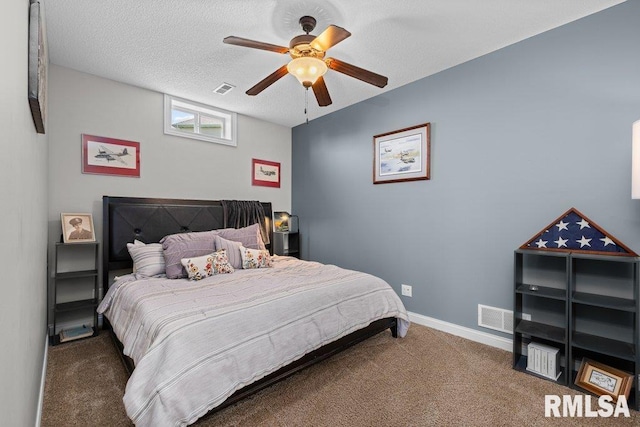 carpeted bedroom featuring visible vents, ceiling fan, and baseboards