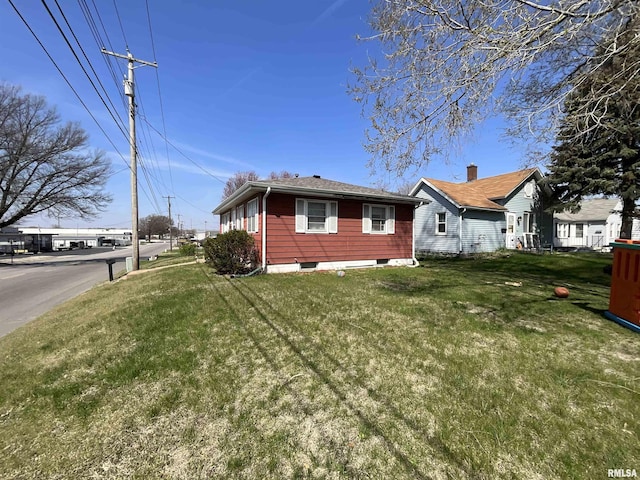 715 31st Ave, Rock Island, IL 61201 - view of home's exterior featuring a yard