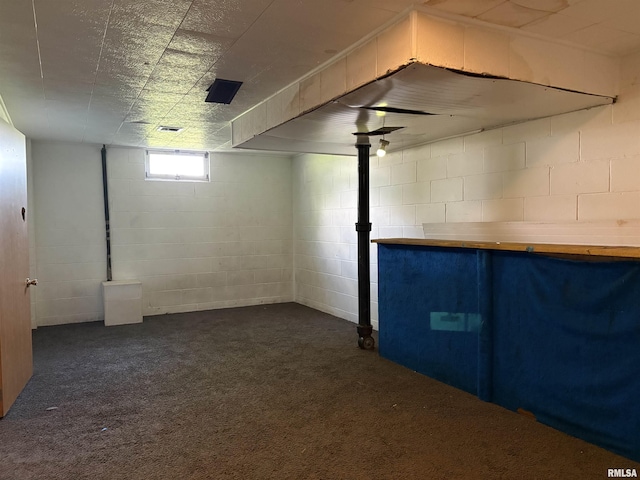 715 31st Ave, Rock Island, IL 61201 - basement with dark colored carpet