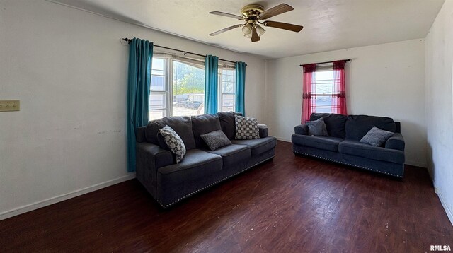 715 31st Ave, Rock Island, IL 61201 - living area with dark wood finished floors, ceiling fan, and baseboards