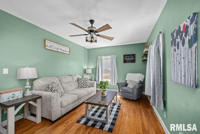 1117 S Ohio Ave, Davenport, IA 52802 - living room with baseboards, a ceiling fan, and wood finished floors