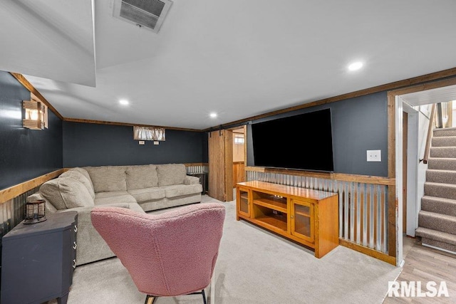 1117 S Ohio Ave, Davenport, IA 52802 - living room with stairs, visible vents, and recessed lighting