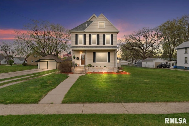 608 S Oakwood Ave, Geneseo, IL 61254 - traditional style home with a garage, covered porch, a front lawn, and an outbuilding
