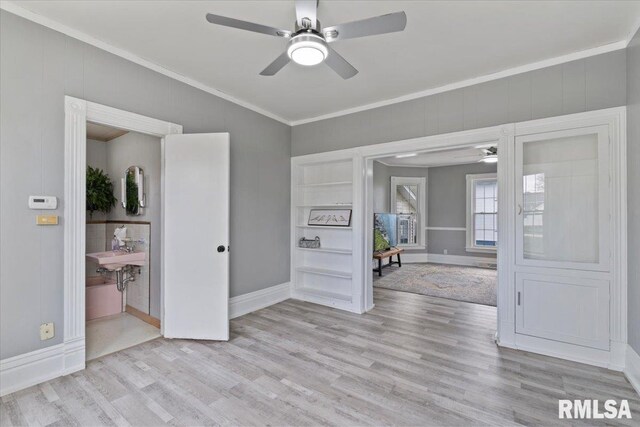 608 S Oakwood Ave, Geneseo, IL 61254 - empty room featuring a ceiling fan, crown molding, wood finished floors, and baseboards