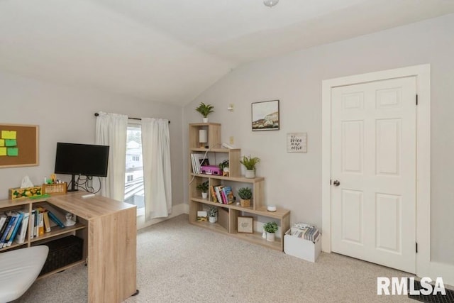 home office featuring vaulted ceiling and carpet