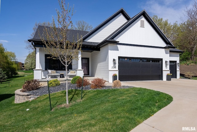 4048 Meadowlark Ct, Bettendorf, IA 52722 - modern inspired farmhouse featuring concrete driveway, a shingled roof, a front yard, an attached garage, and a porch