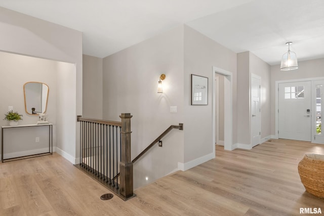 4048 Meadowlark Ct, Bettendorf, IA 52722 - foyer entrance with wood finished floors and baseboards