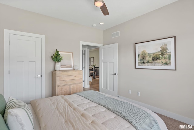 4048 Meadowlark Ct, Bettendorf, IA 52722 - bedroom featuring baseboards, visible vents, ceiling fan, and carpet
