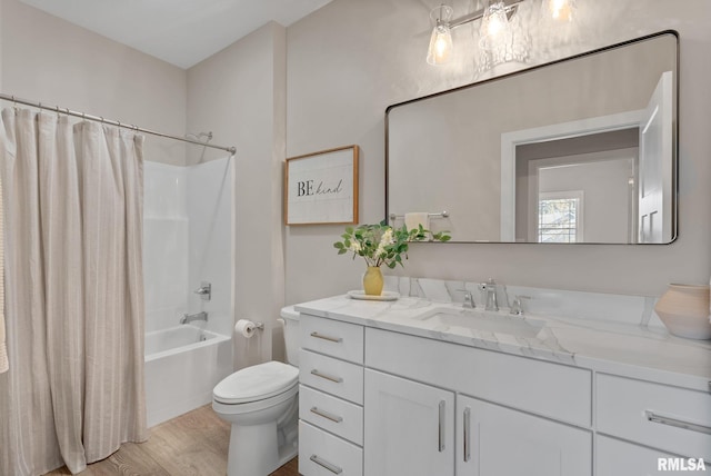 4048 Meadowlark Ct, Bettendorf, IA 52722 - bathroom with toilet, vanity, shower / tub combo, and wood finished floors