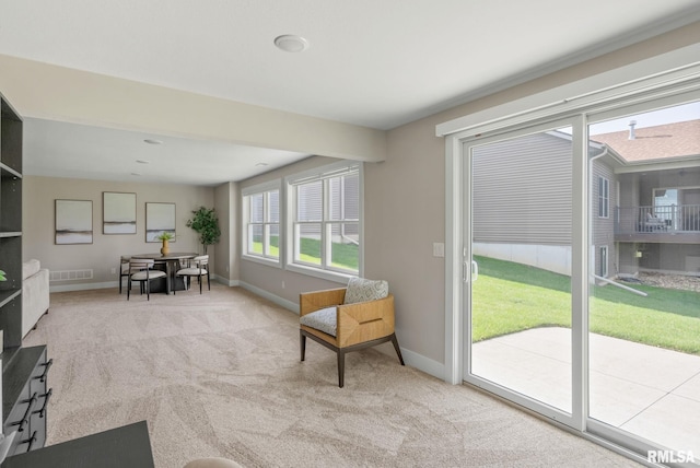 4048 Meadowlark Ct, Bettendorf, IA 52722 - sitting room featuring visible vents, carpet flooring, and baseboards