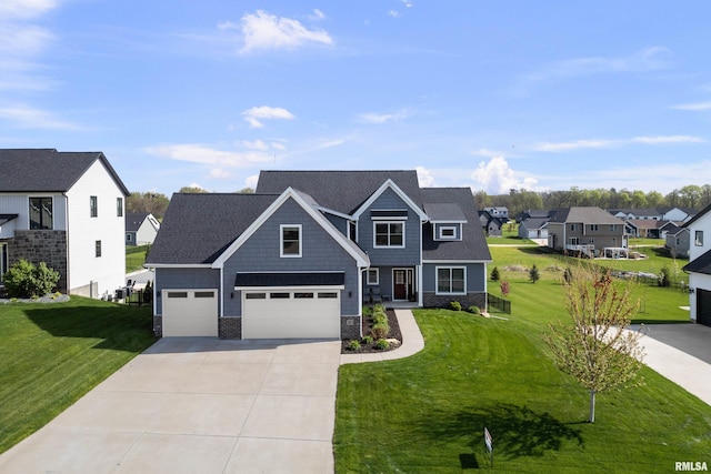 craftsman inspired home featuring concrete driveway, a front yard, a residential view, and stone siding