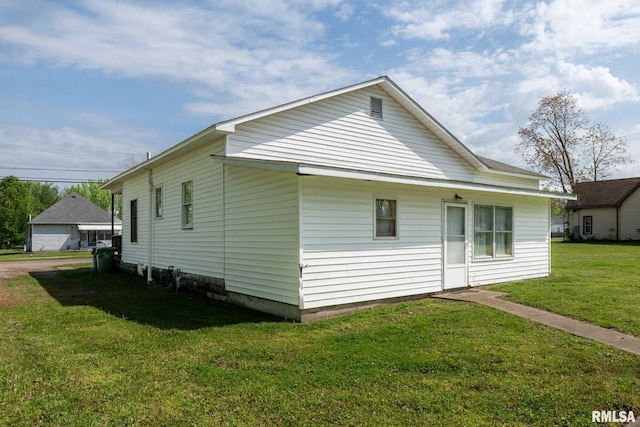view of property exterior featuring a yard