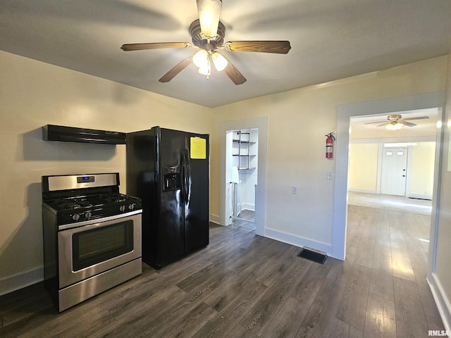 1731 W 5th St, Davenport, IA 52802 - kitchen featuring gas stove, black fridge, ceiling fan, dark wood-type flooring, and baseboards