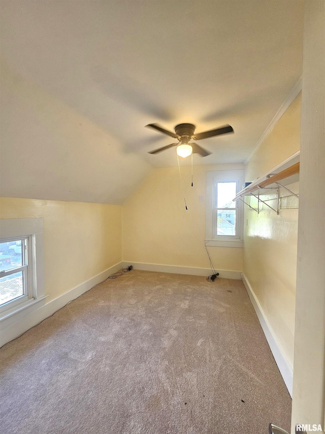 1731 W 5th St, Davenport, IA 52802 - additional living space featuring carpet, baseboards, a ceiling fan, and lofted ceiling