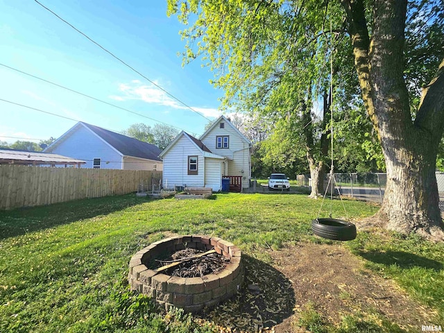 1731 W 5th St, Davenport, IA 52802 - view of yard featuring a fire pit