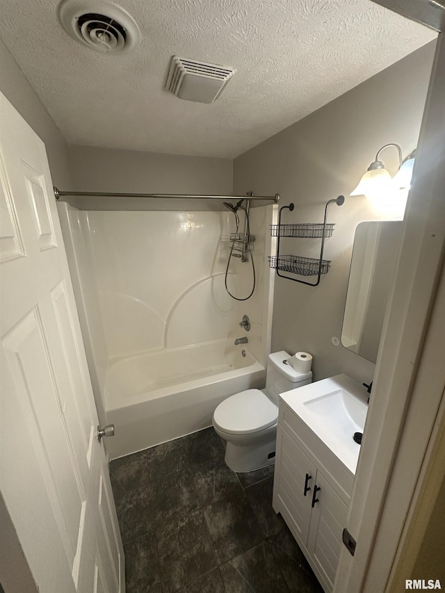 1000 N Almond St, Carbondale, IL 62901 - full bathroom with visible vents, a textured ceiling, shower / bath combination, and vanity