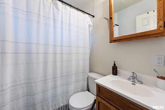 1925 N Fairmount St, Davenport, IA 52804 - full bathroom featuring vanity, toilet, and curtained shower