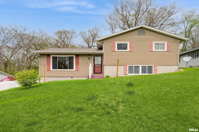 12323 Niabi Zoo Rd, Coal Valley, IL 61240 - split level home featuring a front lawn and roof with shingles