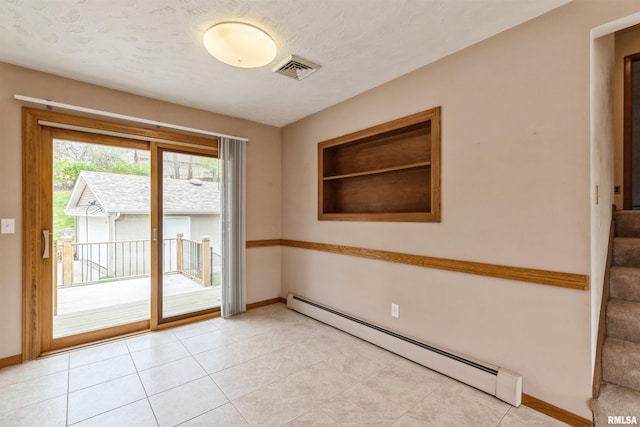 12323 Niabi Zoo Rd, Coal Valley, IL 61240 - interior space with visible vents, stairs, baseboard heating, and baseboards