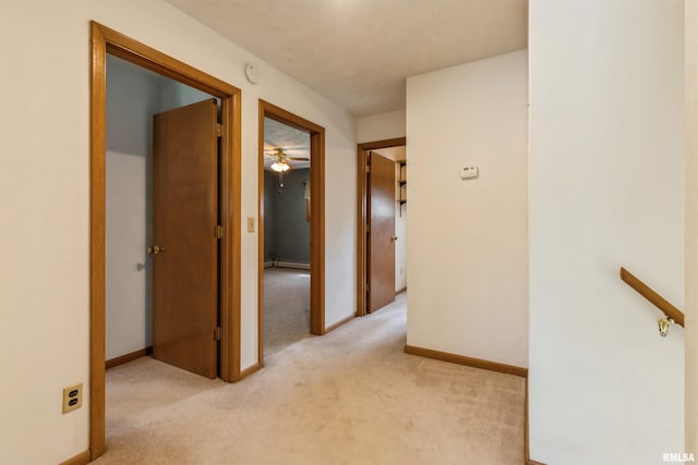 12323 Niabi Zoo Rd, Coal Valley, IL 61240 - hall featuring carpet, baseboards, and a baseboard radiator