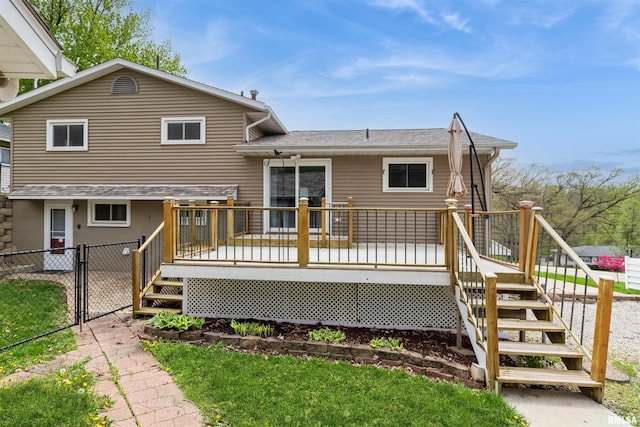 12323 Niabi Zoo Rd, Coal Valley, IL 61240 - rear view of house featuring a wooden deck, stairway, a shingled roof, and fence