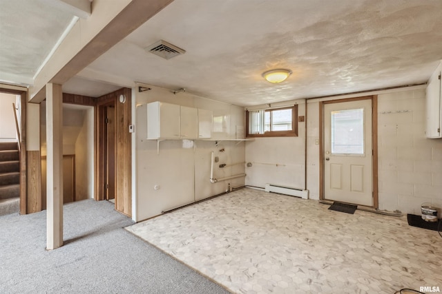 12323 Niabi Zoo Rd, Coal Valley, IL 61240 - kitchen featuring visible vents, a baseboard heating unit, white cabinets, and light colored carpet