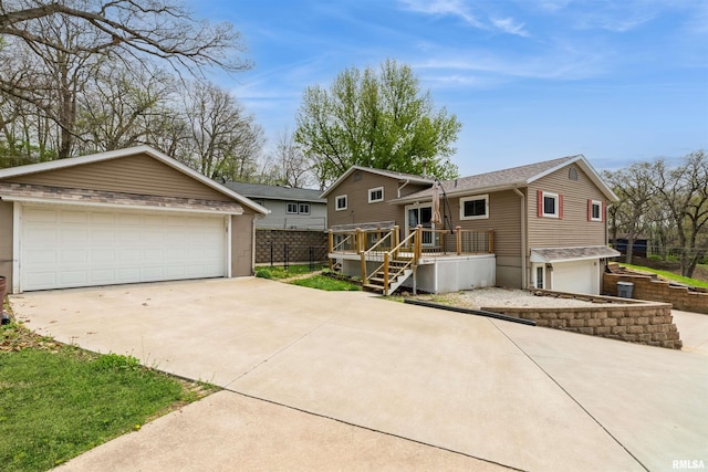 12323 Niabi Zoo Rd, Coal Valley, IL 61240 - split level home with fence and a wooden deck