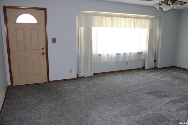 2107 W 38th Pl, Davenport, IA 52806 - carpeted entrance foyer featuring baseboards and ceiling fan