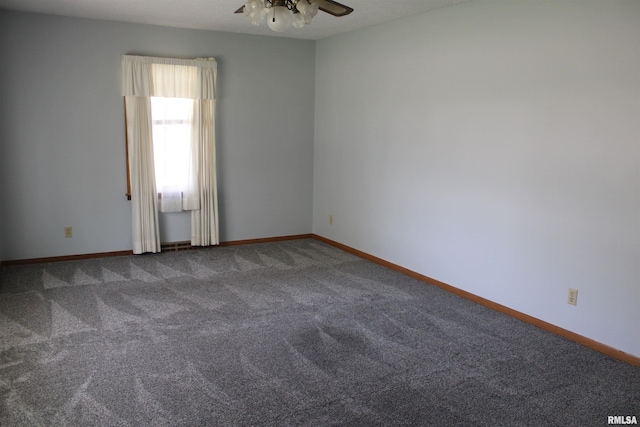 2107 W 38th Pl, Davenport, IA 52806 - spare room with carpet floors, ceiling fan, and baseboards