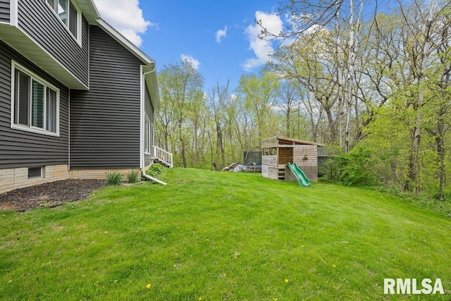 view of yard with a playground