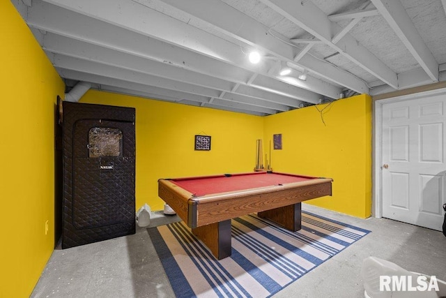 rec room with pool table and concrete flooring