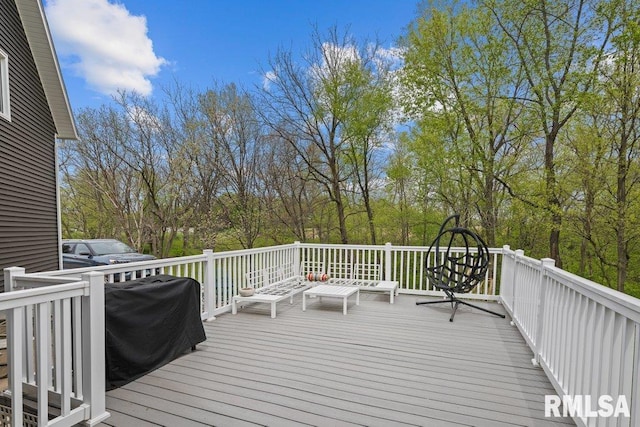 wooden terrace featuring grilling area