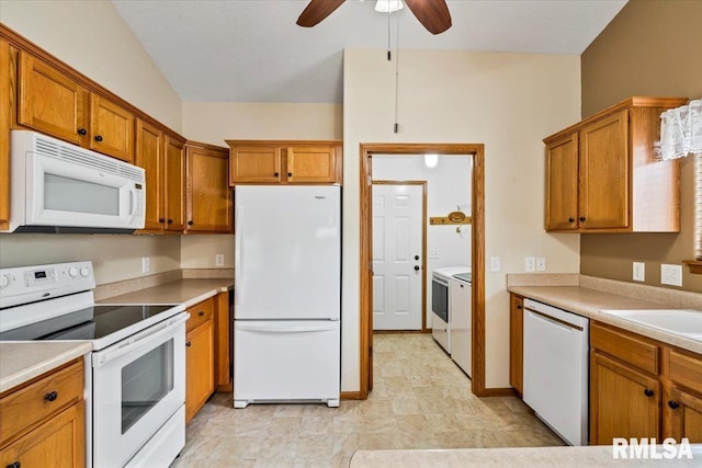 5200 Villa Dr, Davenport, IA 52806 - kitchen with ceiling fan, brown cabinetry, and white appliances