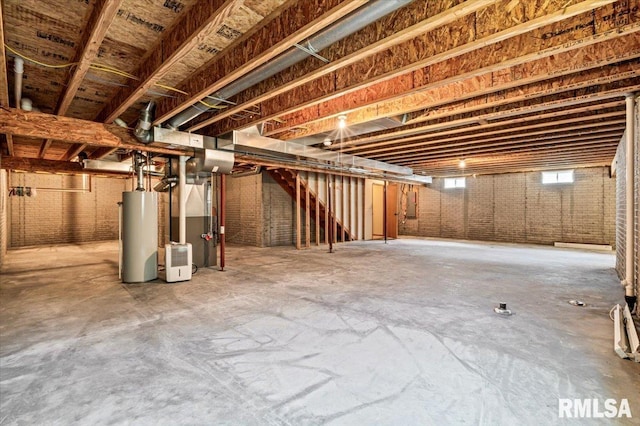 5200 Villa Dr, Davenport, IA 52806 - basement with gas water heater and stairs