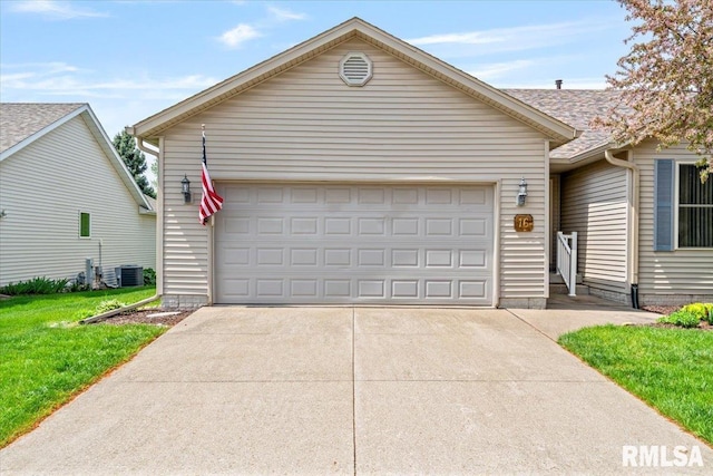 5200 Villa Dr, Davenport, IA 52806 - ranch-style home featuring an attached garage, concrete driveway, and cooling unit