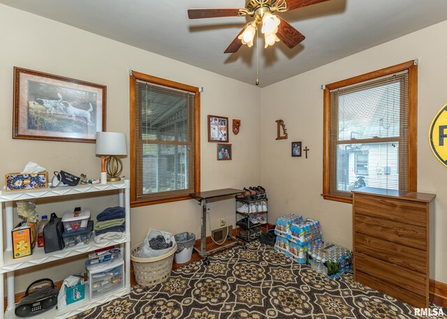 misc room with a ceiling fan