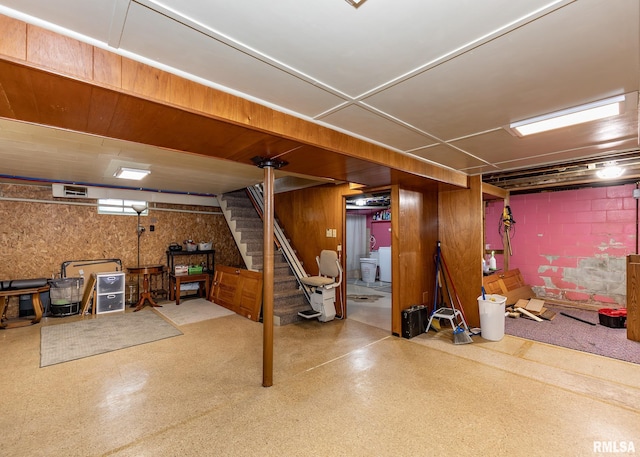 finished basement featuring stairway