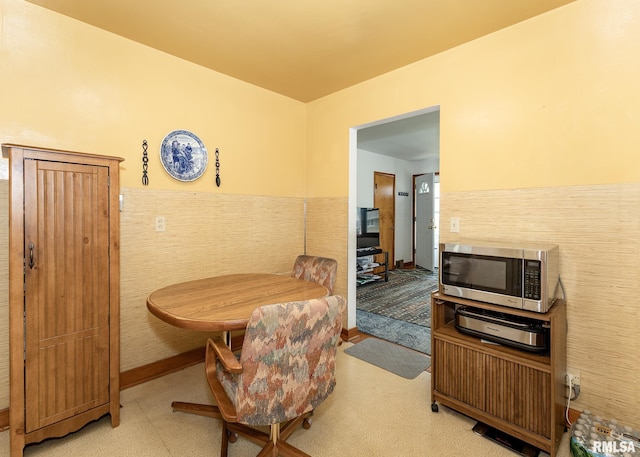 dining space with wainscoting