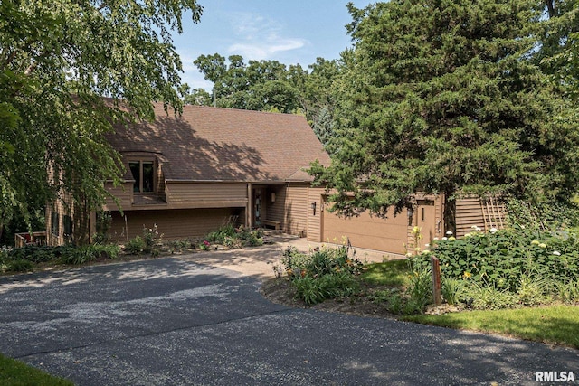 28018 230th St, Le Claire, IA 52753 - view of front of home with driveway