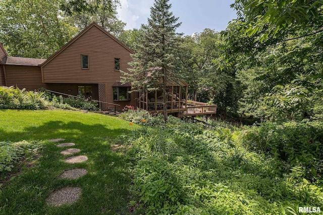 28018 230th St, Le Claire, IA 52753 - view of yard featuring a deck