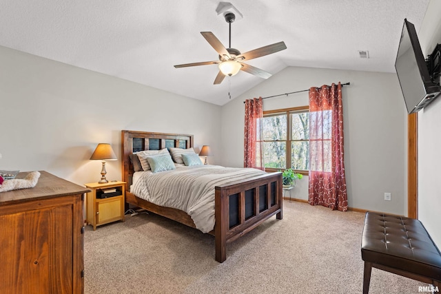 6135 Hillandale Rd, Davenport, IA 52806 - bedroom with a ceiling fan, a textured ceiling, light colored carpet, vaulted ceiling, and baseboards