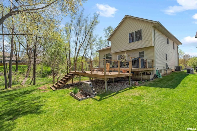 6135 Hillandale Rd, Davenport, IA 52806 - rear view of house with a lawn, a wooden deck, and cooling unit