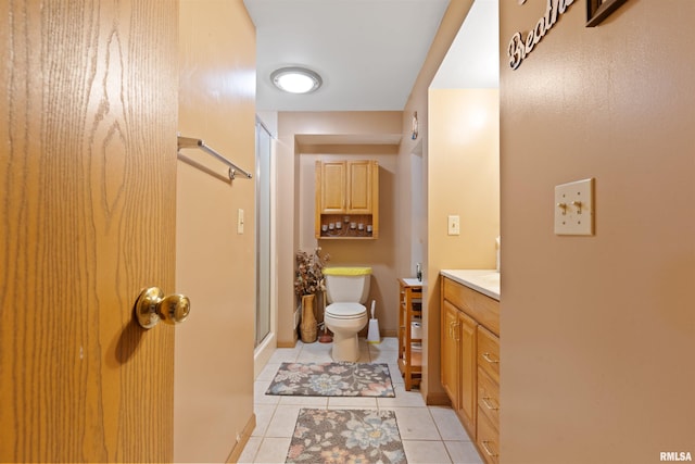 4012 172nd St N, East Moline, IL 61244 - full bathroom featuring vanity, tile patterned floors, a stall shower, and toilet