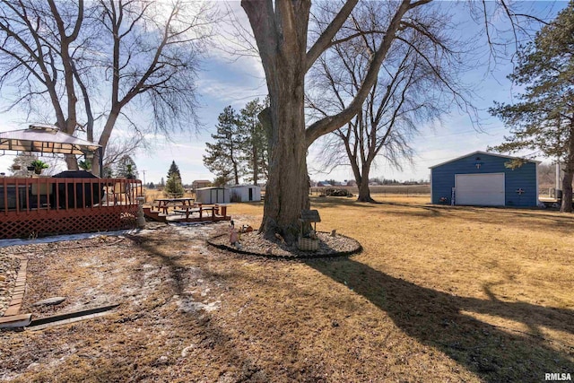 4012 172nd St N, East Moline, IL 61244 - view of yard featuring an outdoor structure, a garage, a deck, and a gazebo