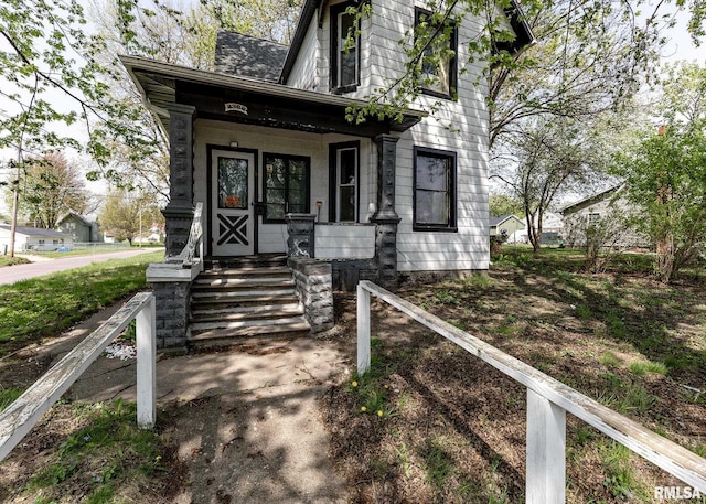 doorway to property featuring a porch